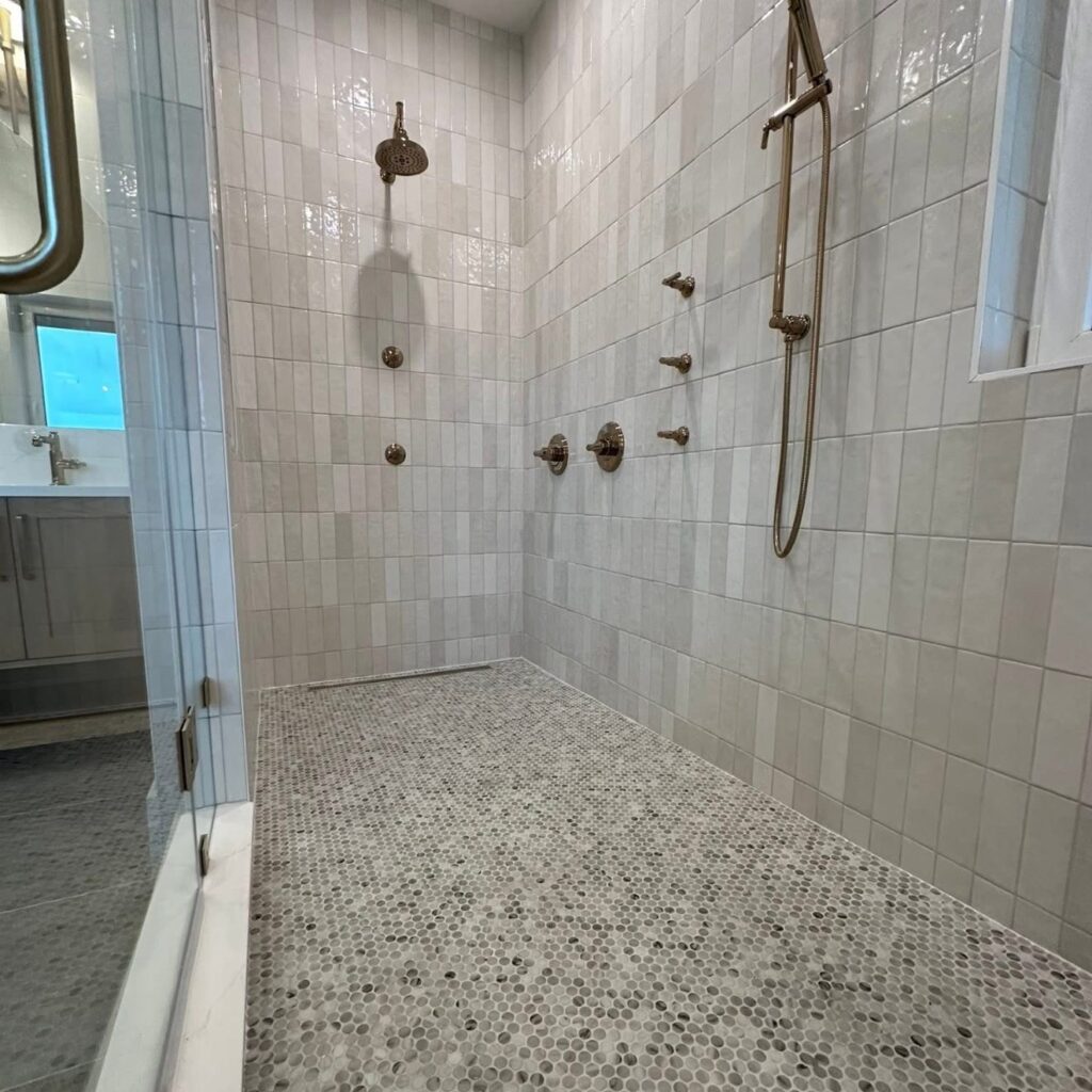 Walk-in shower with penny-round mosaic floor